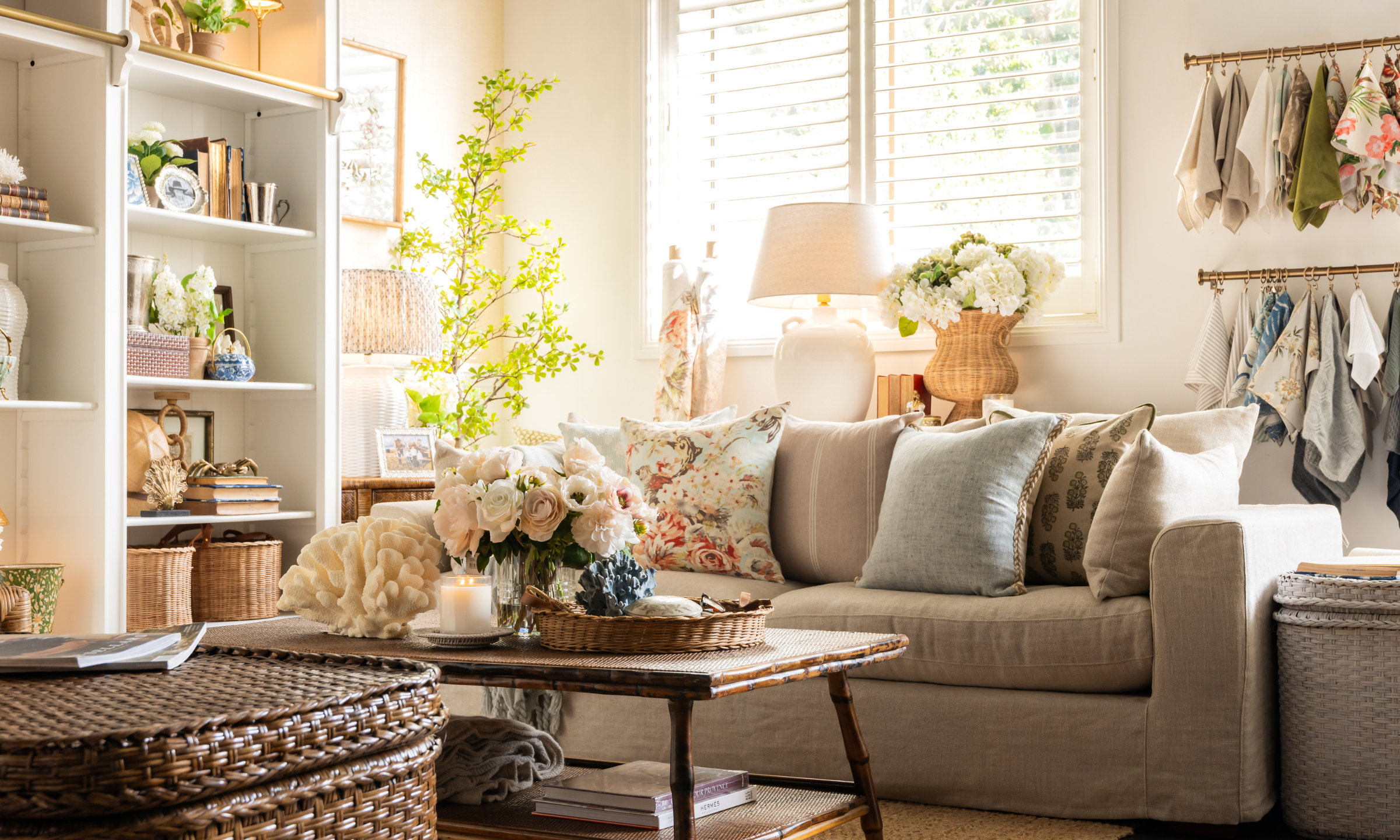 English Coastal styled living room featuring the Clara Lounge and a rattan coffee table. 