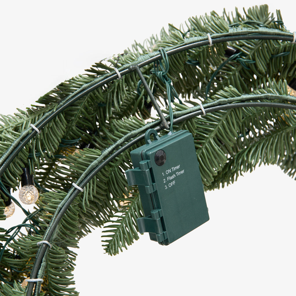 Pinecone & Pineapple Wreaths with Lights Close Up of Battery Pack