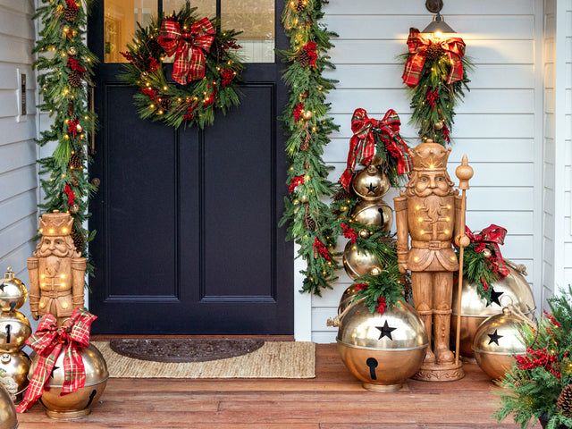Timber-look nutcrackers with red berry.