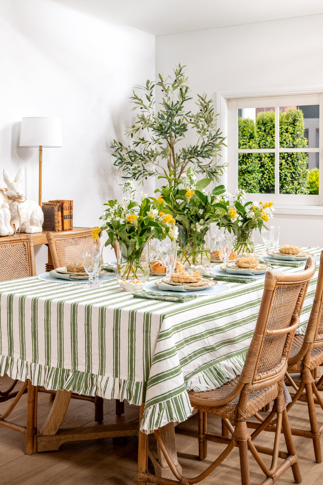 Easter Dining Table with Laya Striped Tablecloth and Brown Antigua Chairs