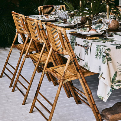 Bamboo folding chairs around a dinner table