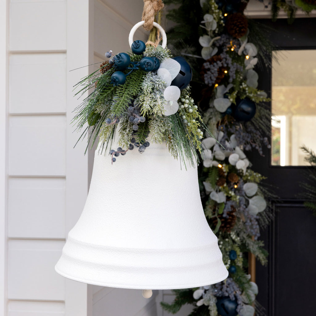 White Christmas bell styled with blueberry pick.