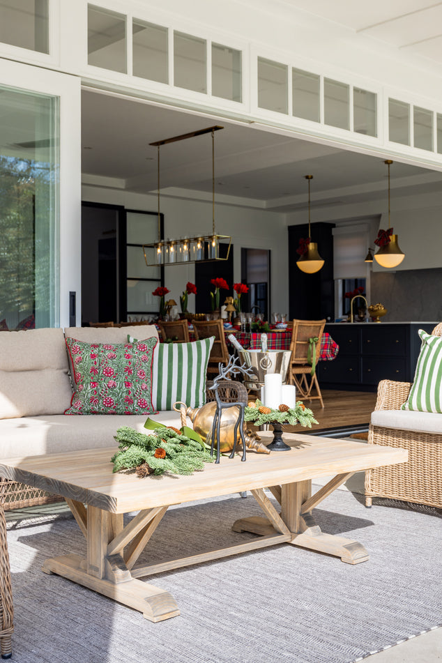outdoor Lounge styled for Christmas with Cushions and Christmas Decor on Coffee Table
