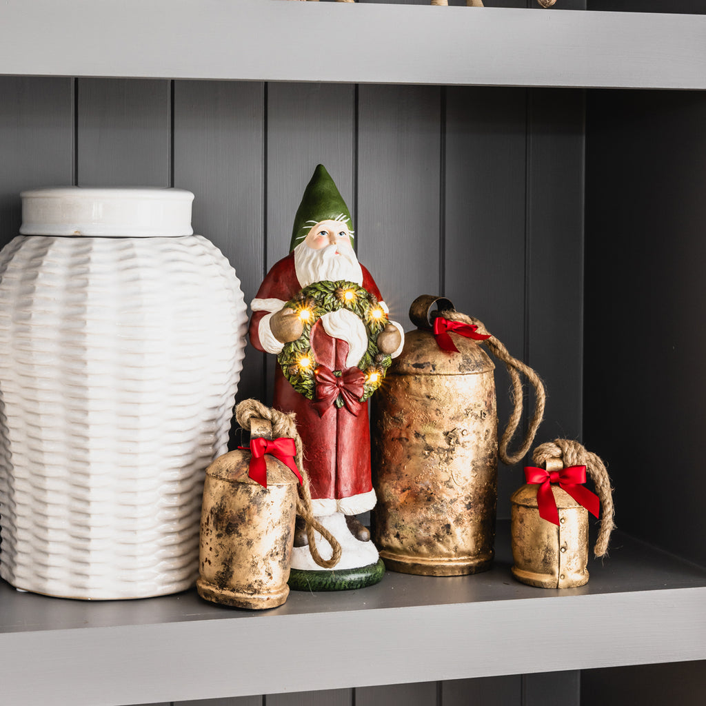 Santa Statue Holding LED Wreath Styled