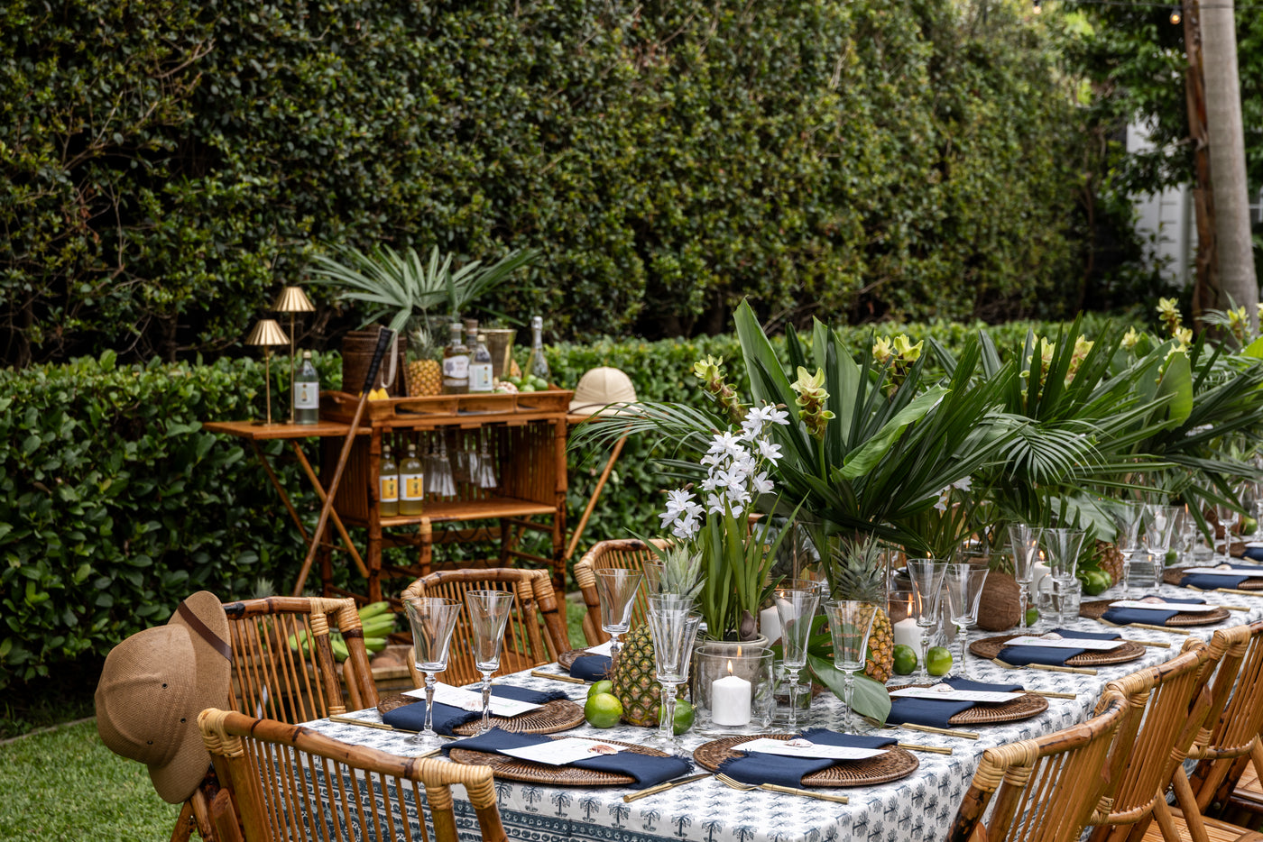Island Dining Table Outside with Palms and Fruit