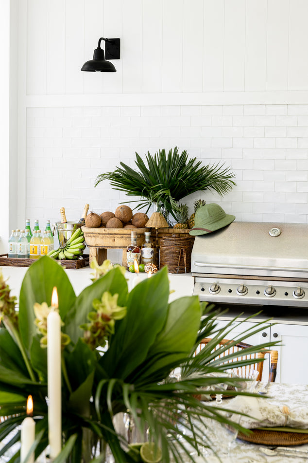 Island Style Bar Setup with Ice Buckets and Coconuts