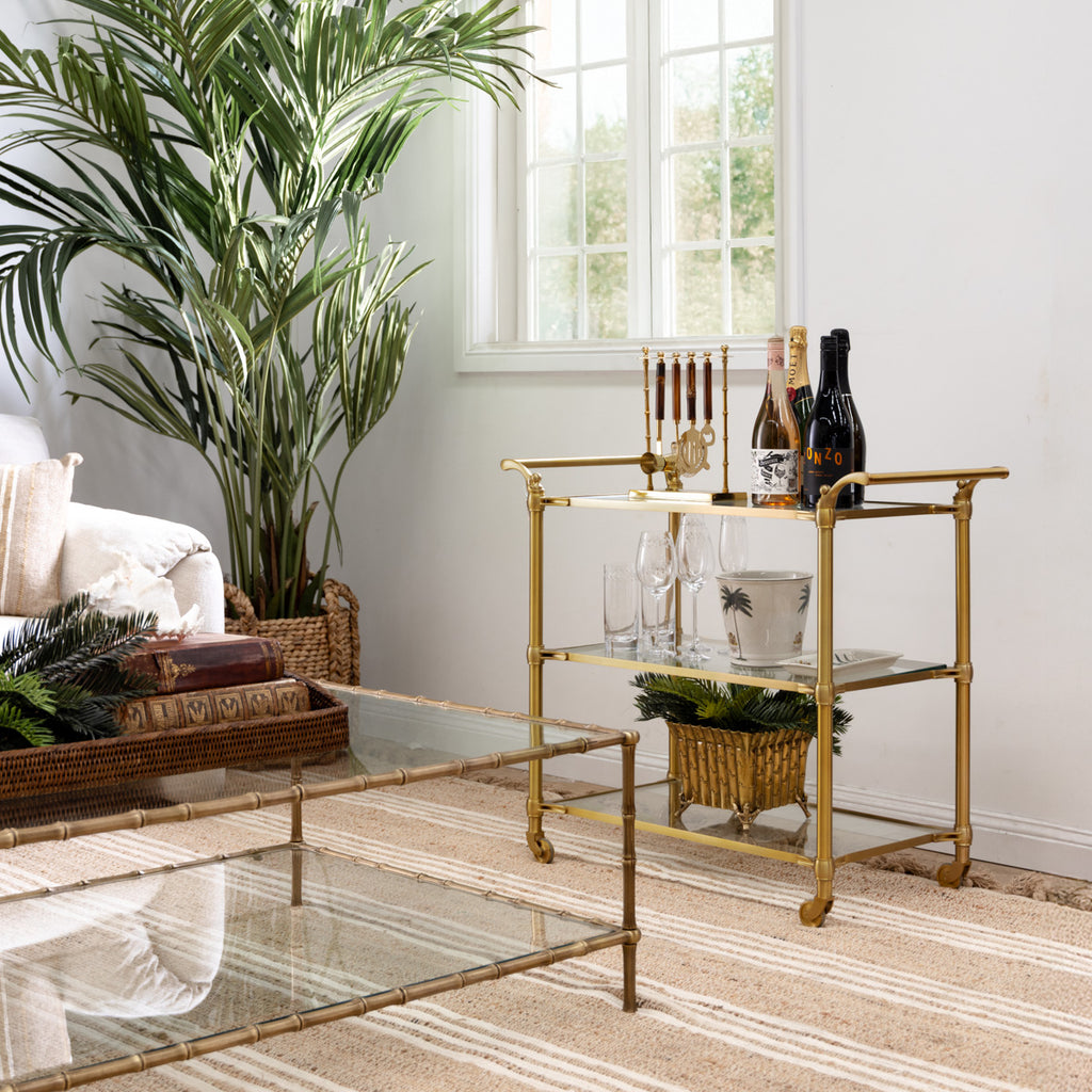 Regent Glass & Brass Bar Cart Trolley Styled in Living Room Near Window and Bar Setup