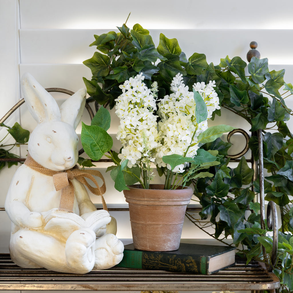 Artificial White Hydrangea in Pot 34cm Styled on Shelf with Bunnies and Books
