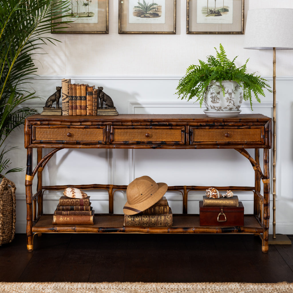 Bamboo Console Table With Three Drawers Styled in Living Room with Plants and Island Decor