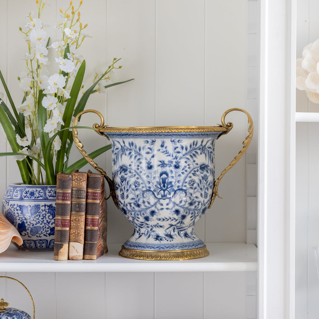 Barclay Urn With Brass Handles Styled on Bookcase with Books and Florals