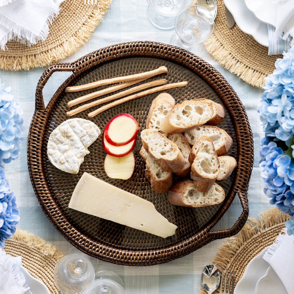 Rattan Cheese Tray With Handle Brown 43cm Styled on Dining Table with Cheese and Bread