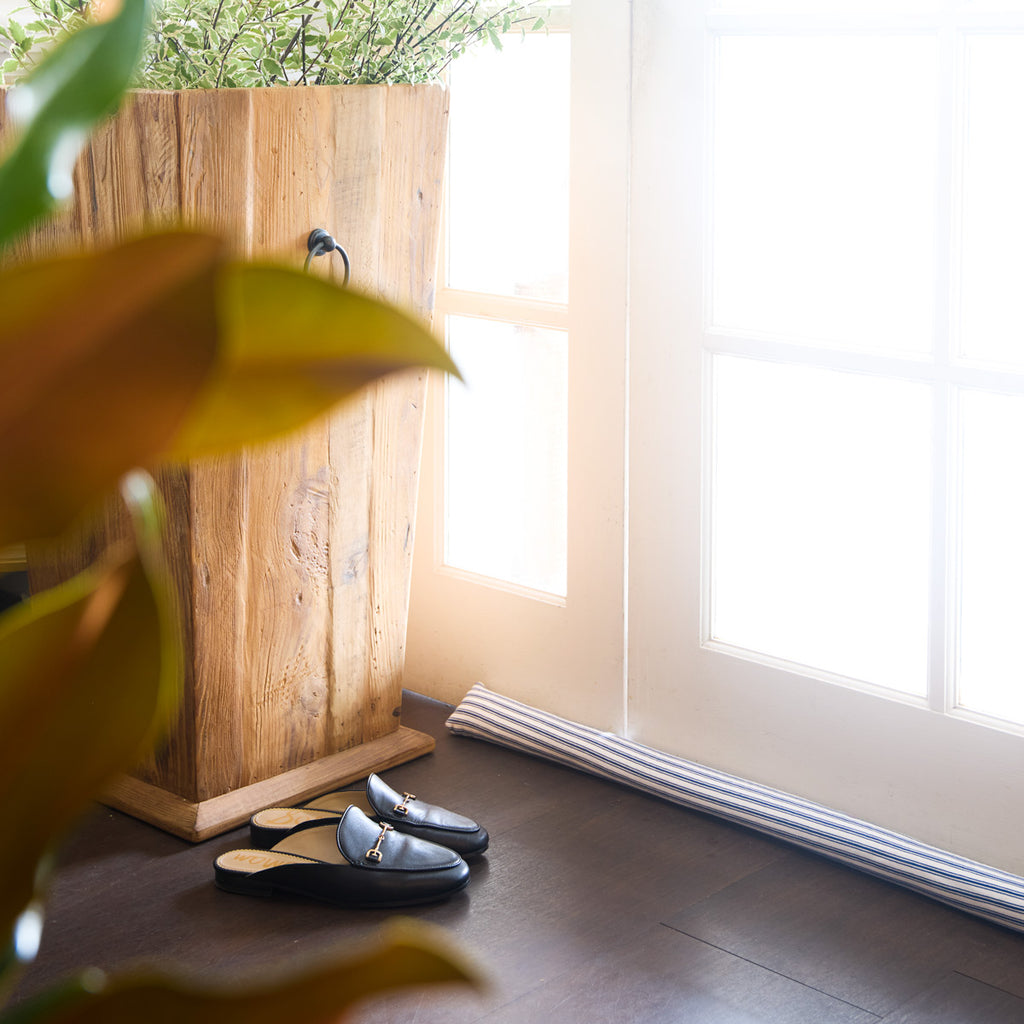 Draught Stopper (Ticking) Styled Shot in Entryway