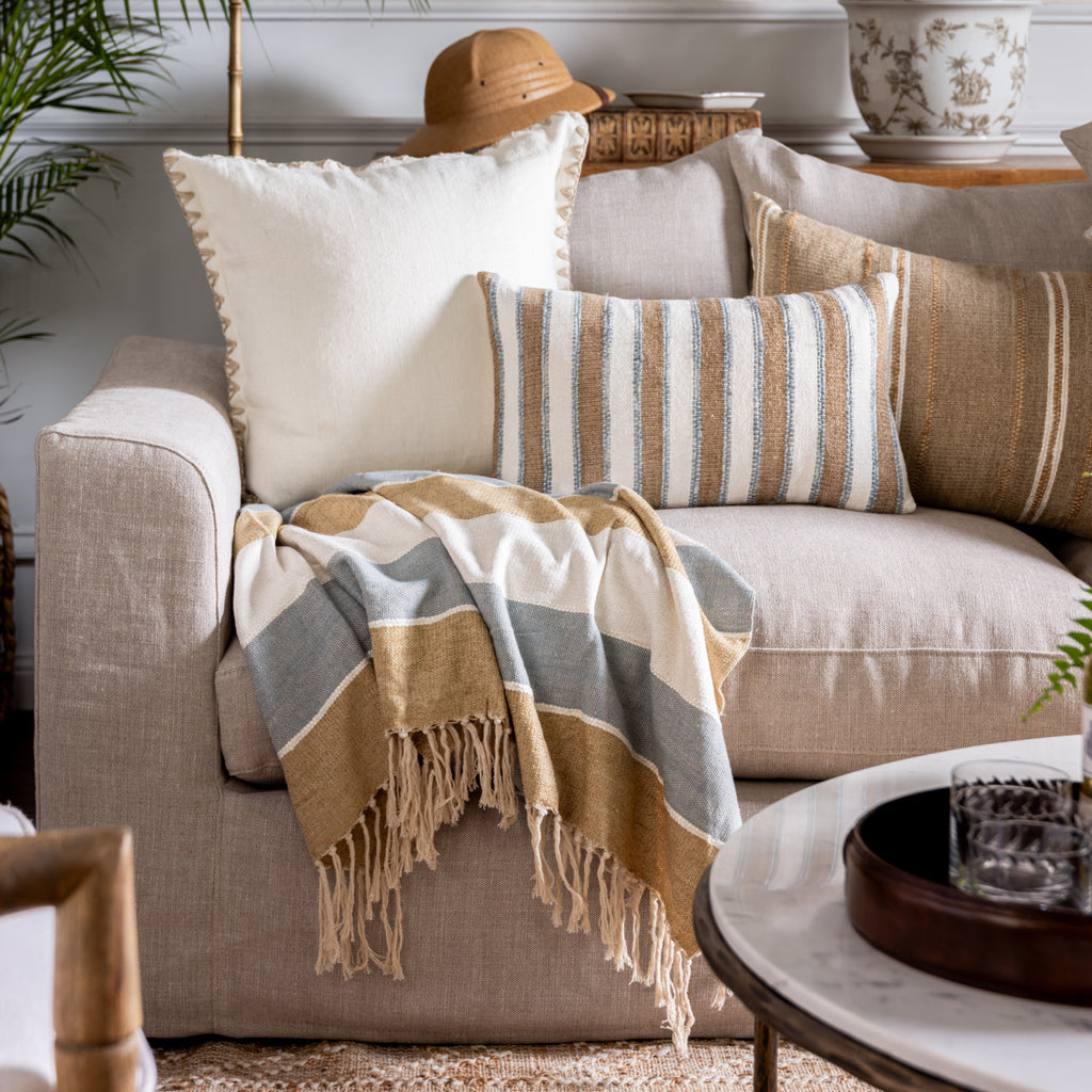 Dune Natural & Light Blue Stripe Throw Styled on Sofa