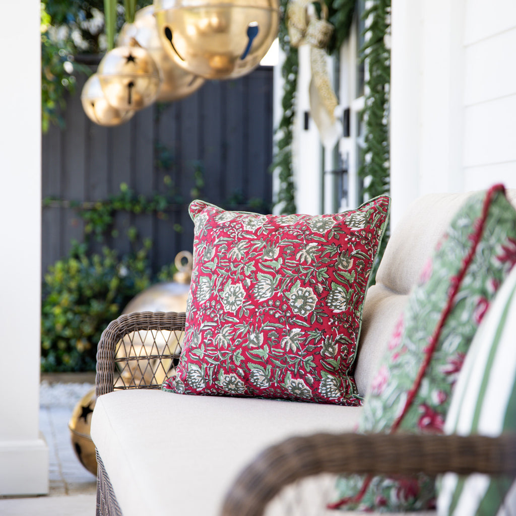 Festive Red Rose Cushion Cover Styled on Outdoor Lounge