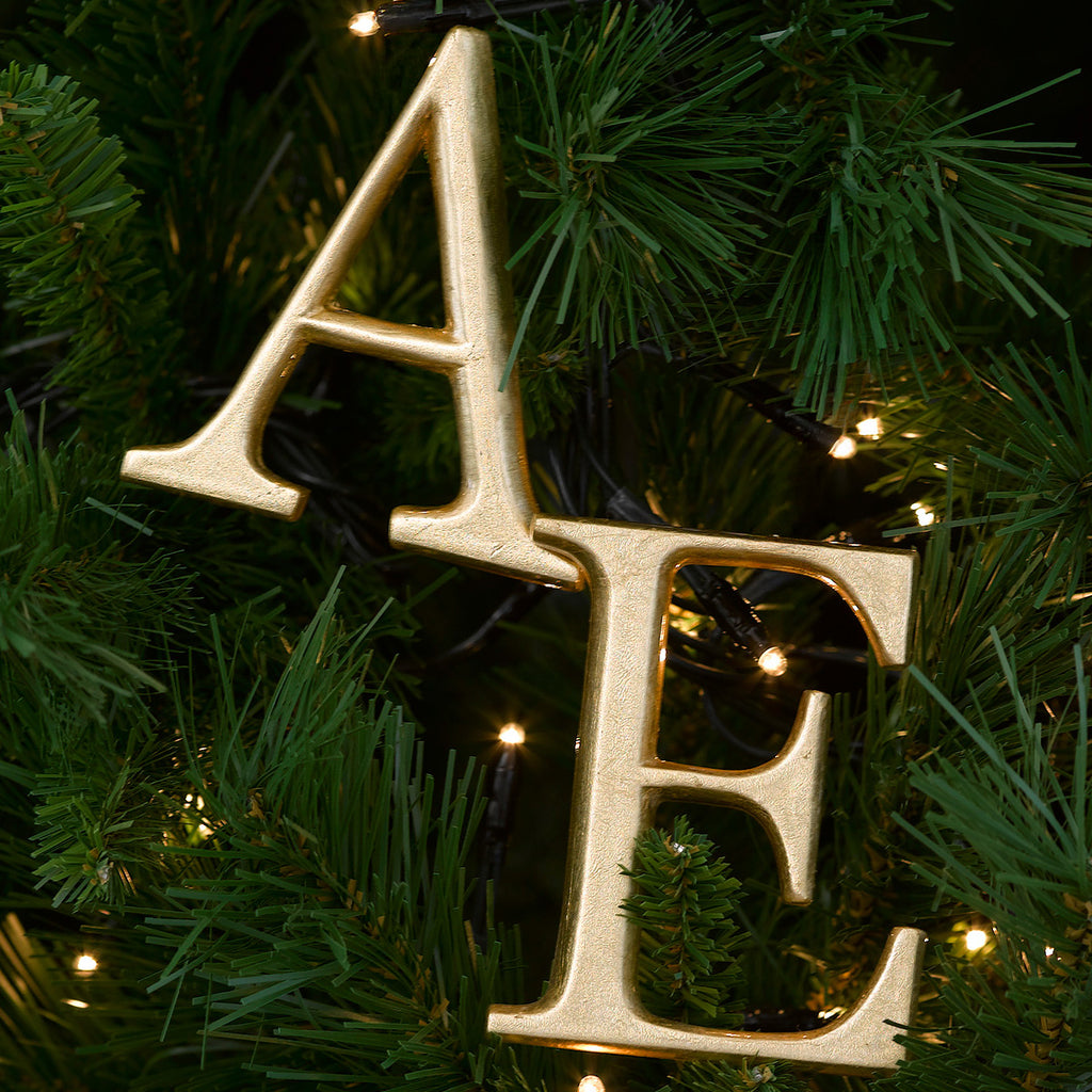 gold letters on Christmas tree