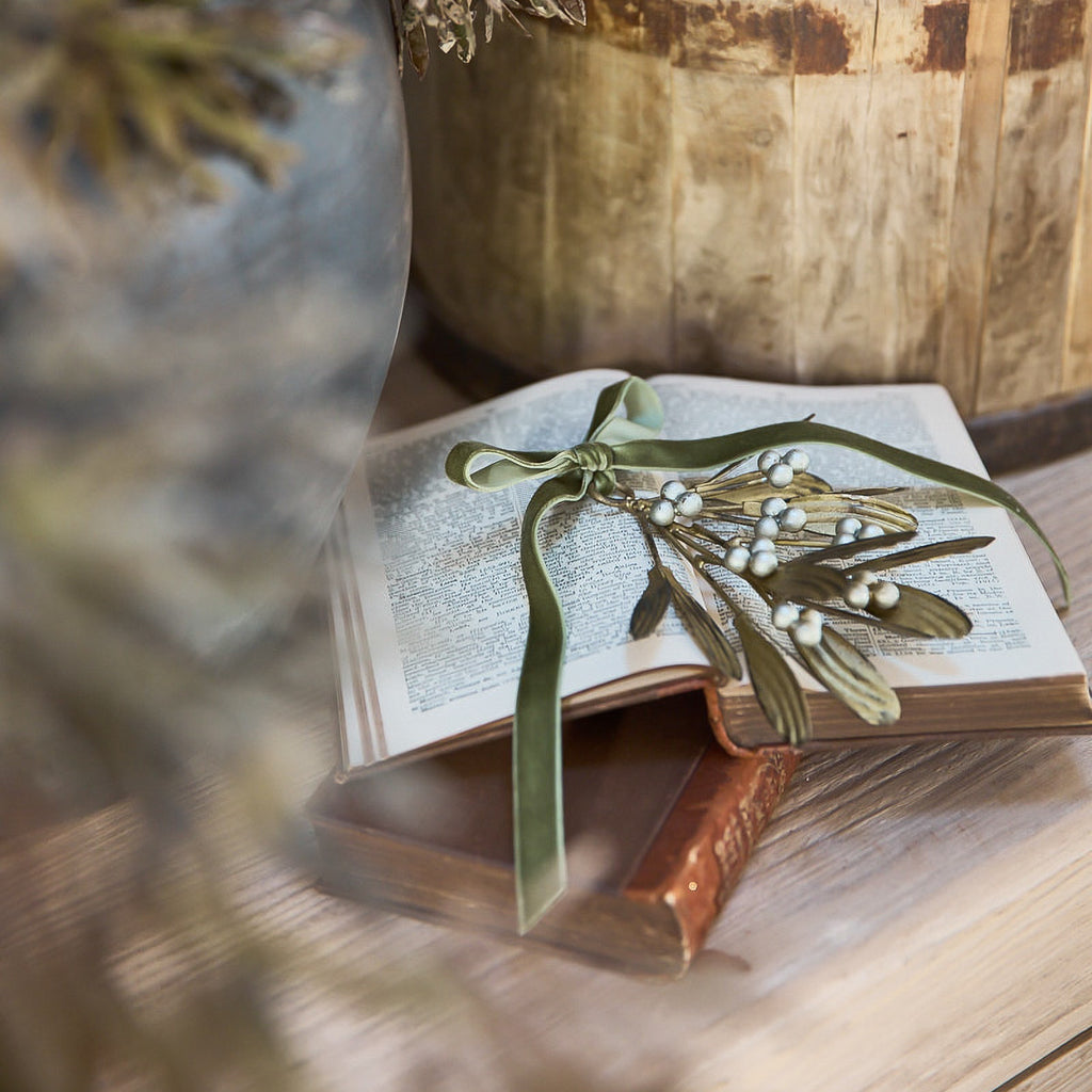 Metal Hanging Berry Spray (Silver) Styled on Book with Ribbon
