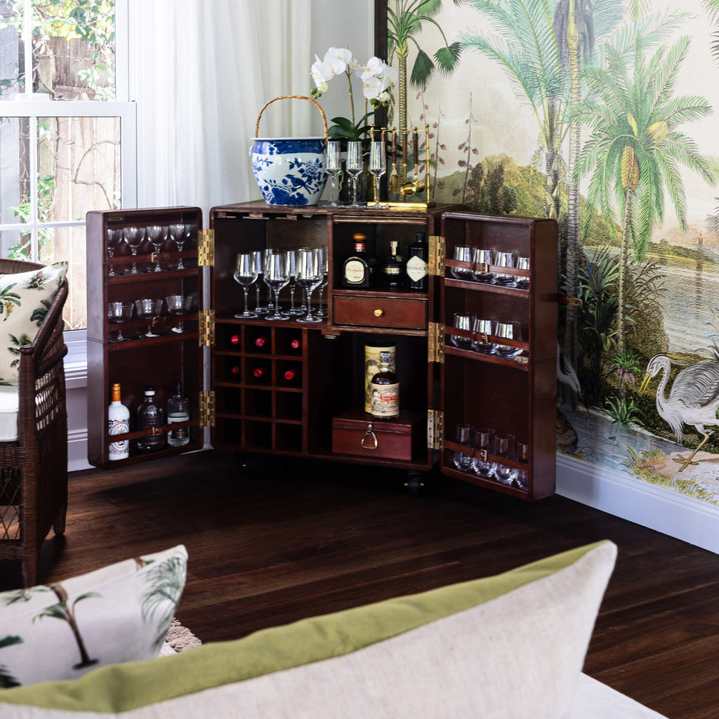 Leather Bar Cabinet Styled in a tropical inspired room.