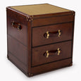 Brown leather nightstand with three drawers on a white background