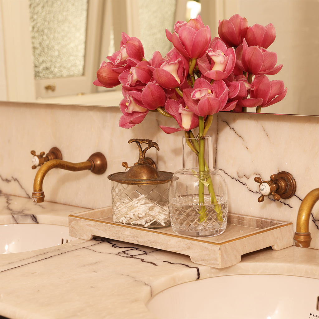 Marble Beige Tray Styled in Bathroom with Cotton Swabs and Orchid