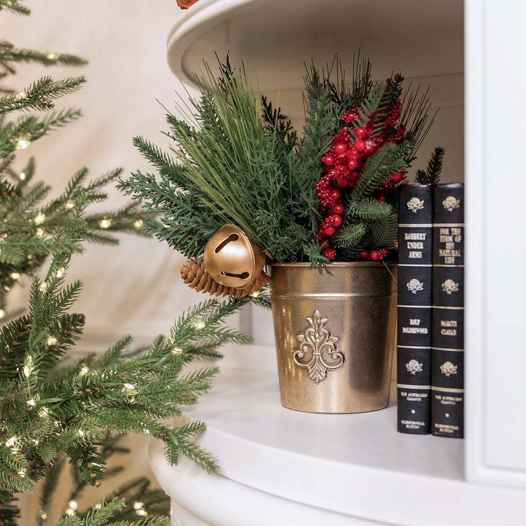 Medallion Planter With Red Berry Foliage on White Bookcase.