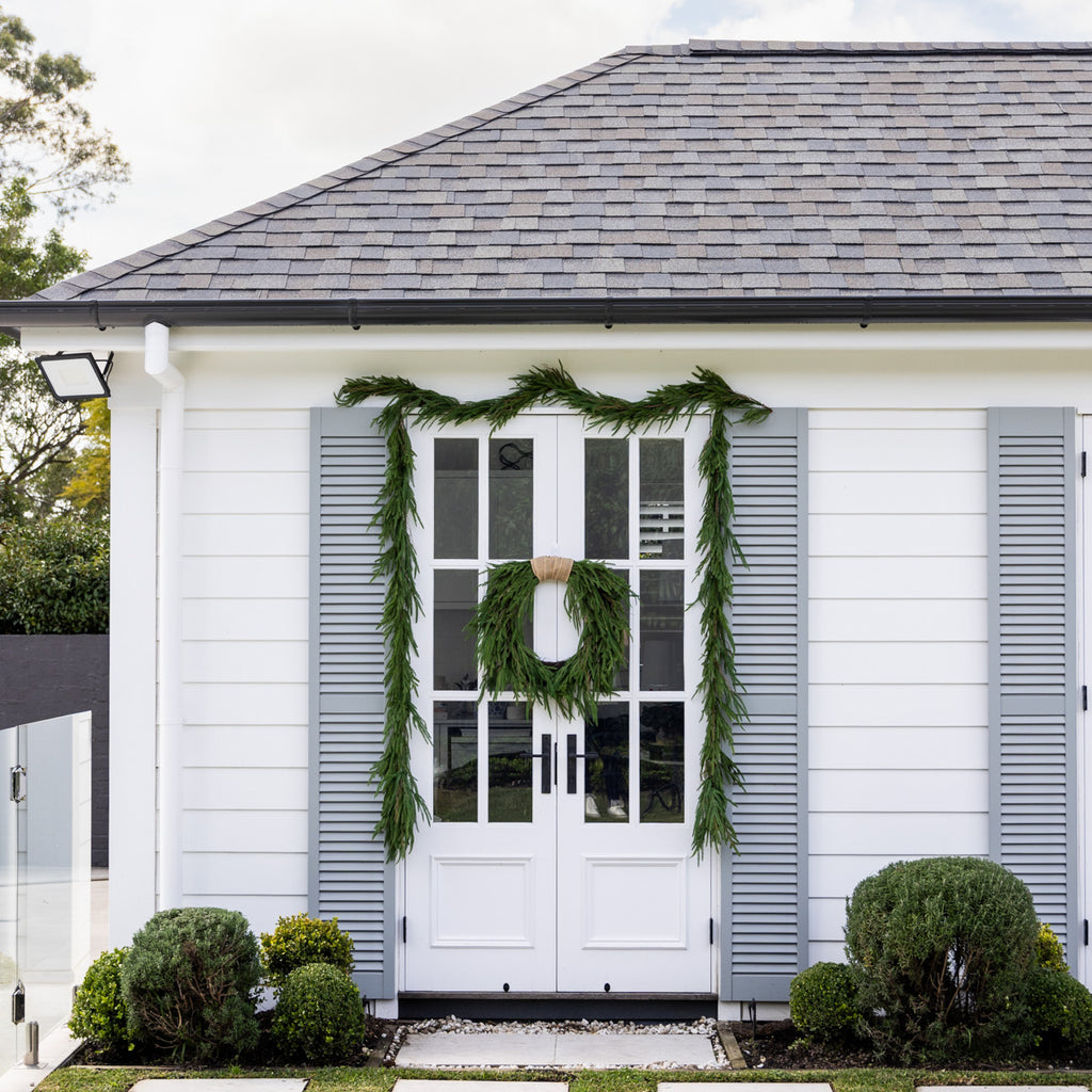 Norfolk Pine Wreaths Styled on Pool House Door