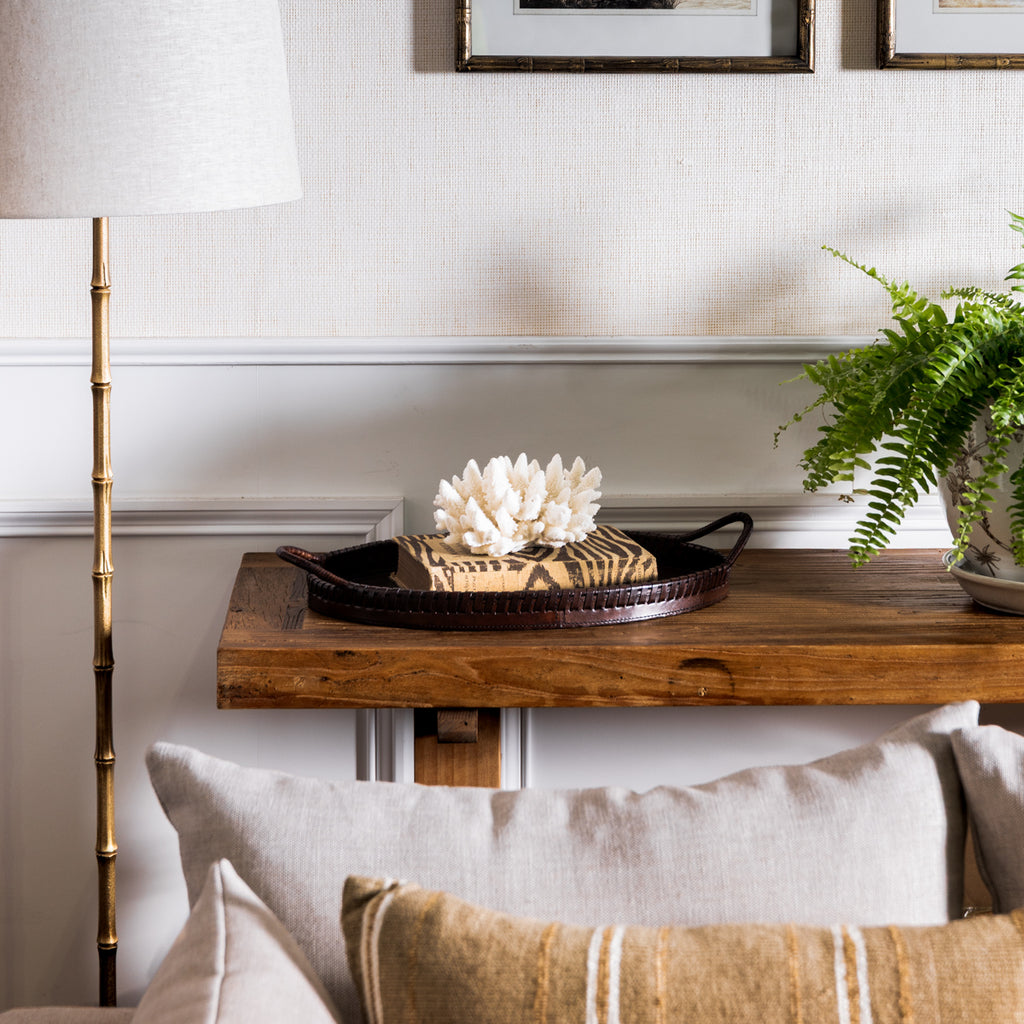 Oval Leather Tray Styled on Console with Coral and Book