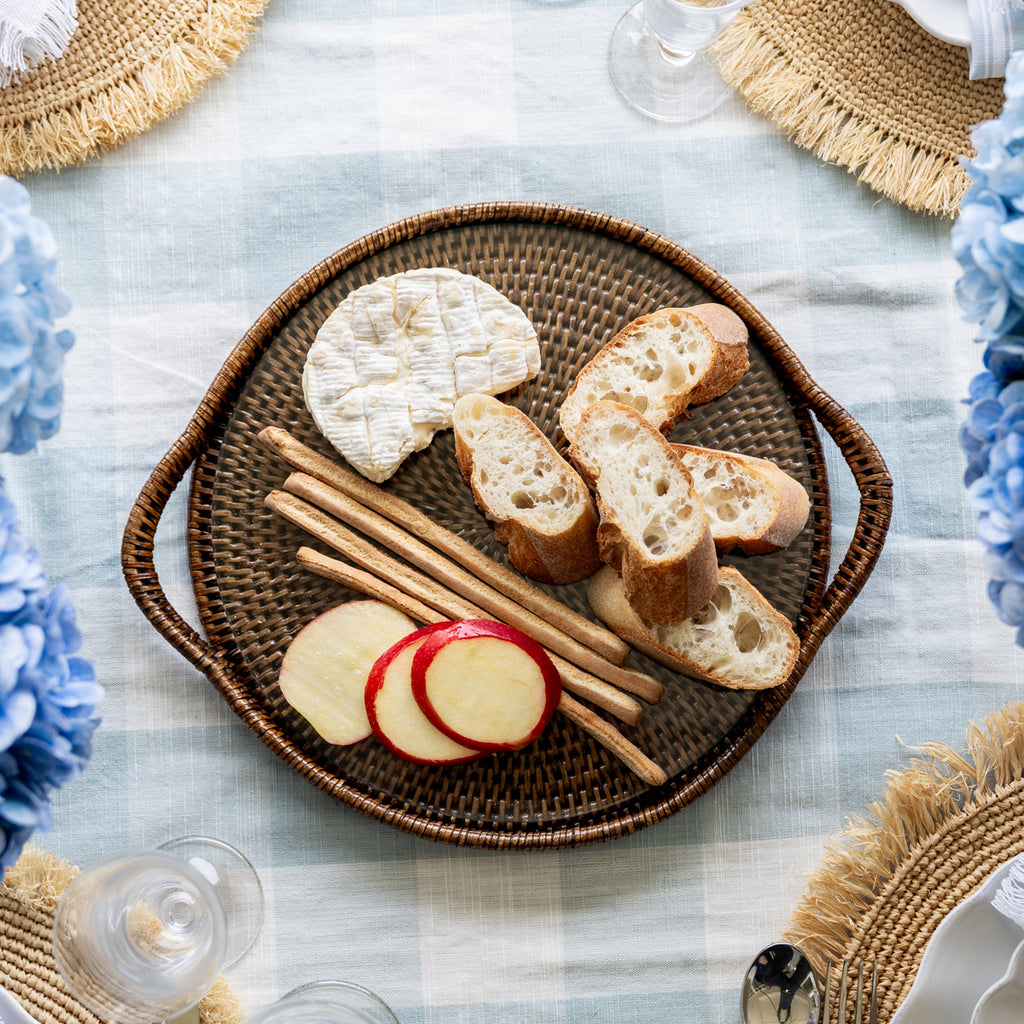 Rattan Cheese Tray Brown 31cm Styled on Dining Table with Cheese and Bread