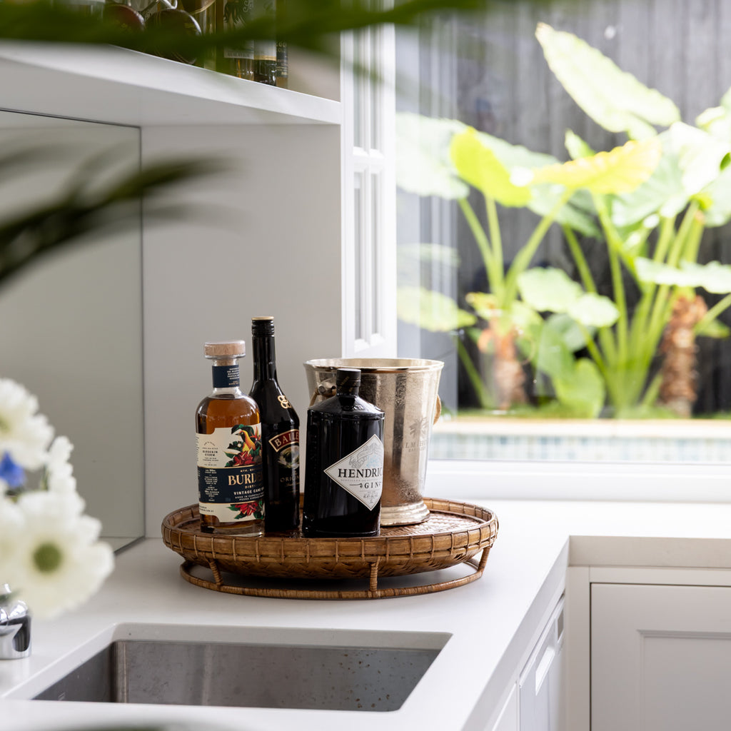 Rattan Rice Tray Round Brown Styled on Bar with Ice Bucket