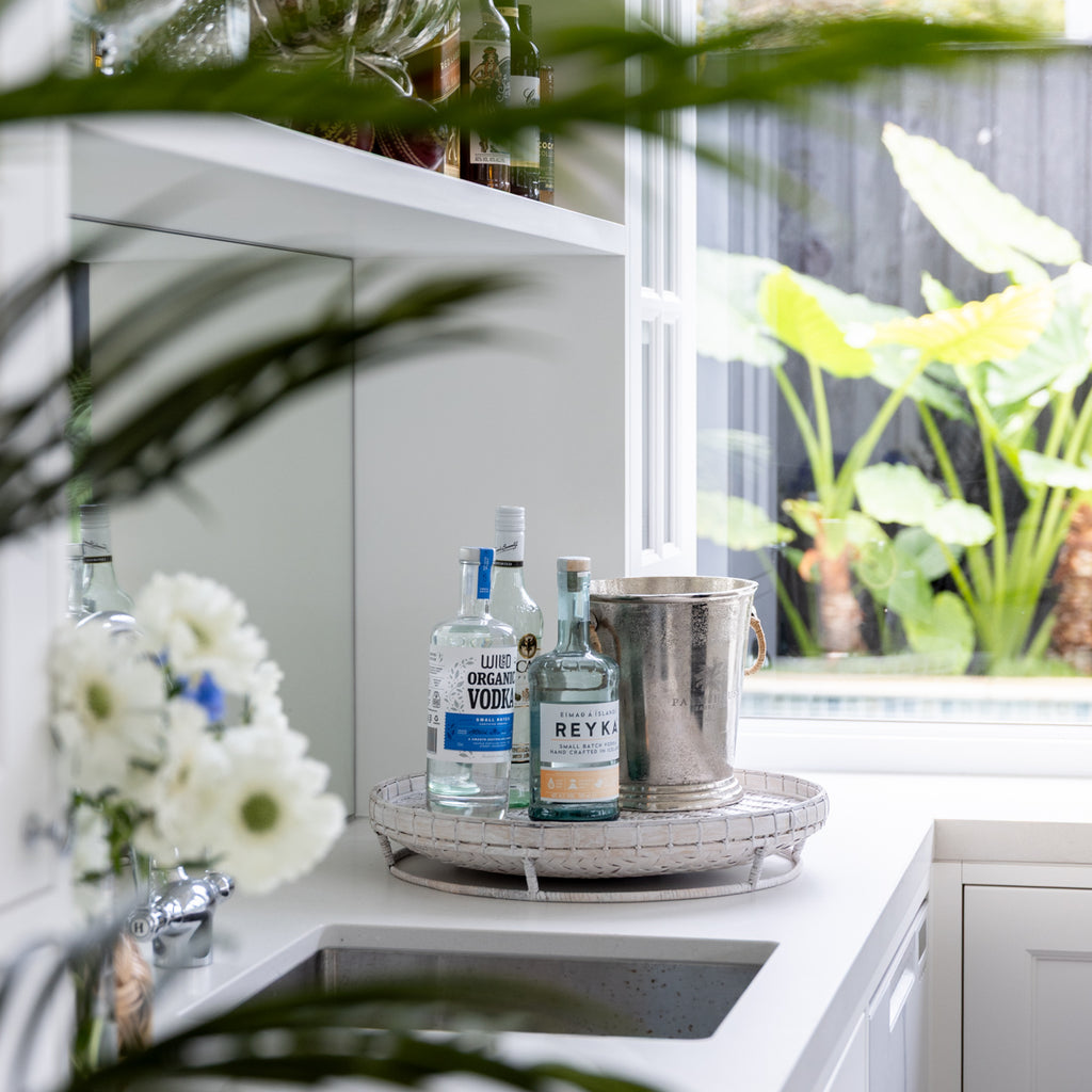 Rattan Rice Tray Round White Styled on Bar with Ice Bucket