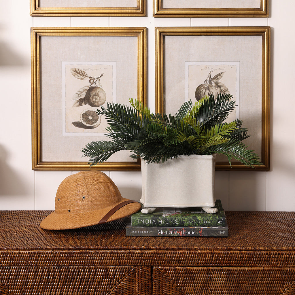 Rectangle Decorative Off-White Planter with Legs Styled with Ratan Sideboard and Plants