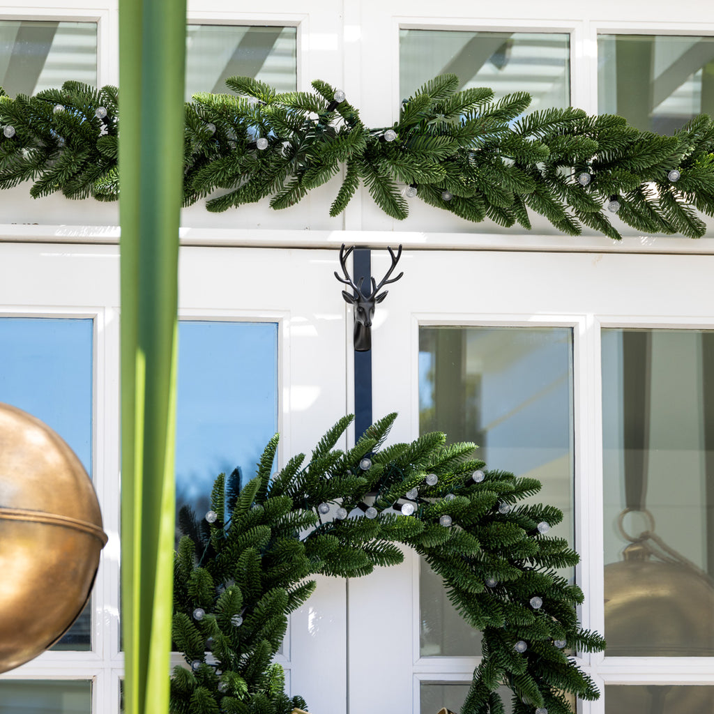 Reindeer Wreath Hanger (Black) Styled on Door with Garland and Wreath