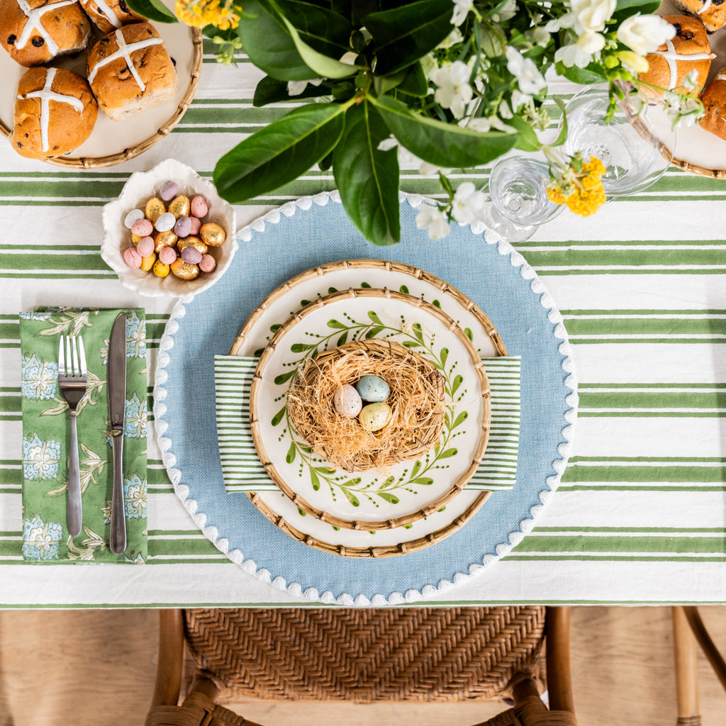 Round Placemat With White Edging (Blue) Styled on Easter Table with Shell Bamboo Dinnerware and Stripe Laya Napery