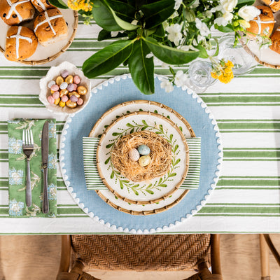 Round Placemat With White Edging (Blue) Styled on Easter Table with Shell Bamboo Dinnerware and Stripe Laya Napery