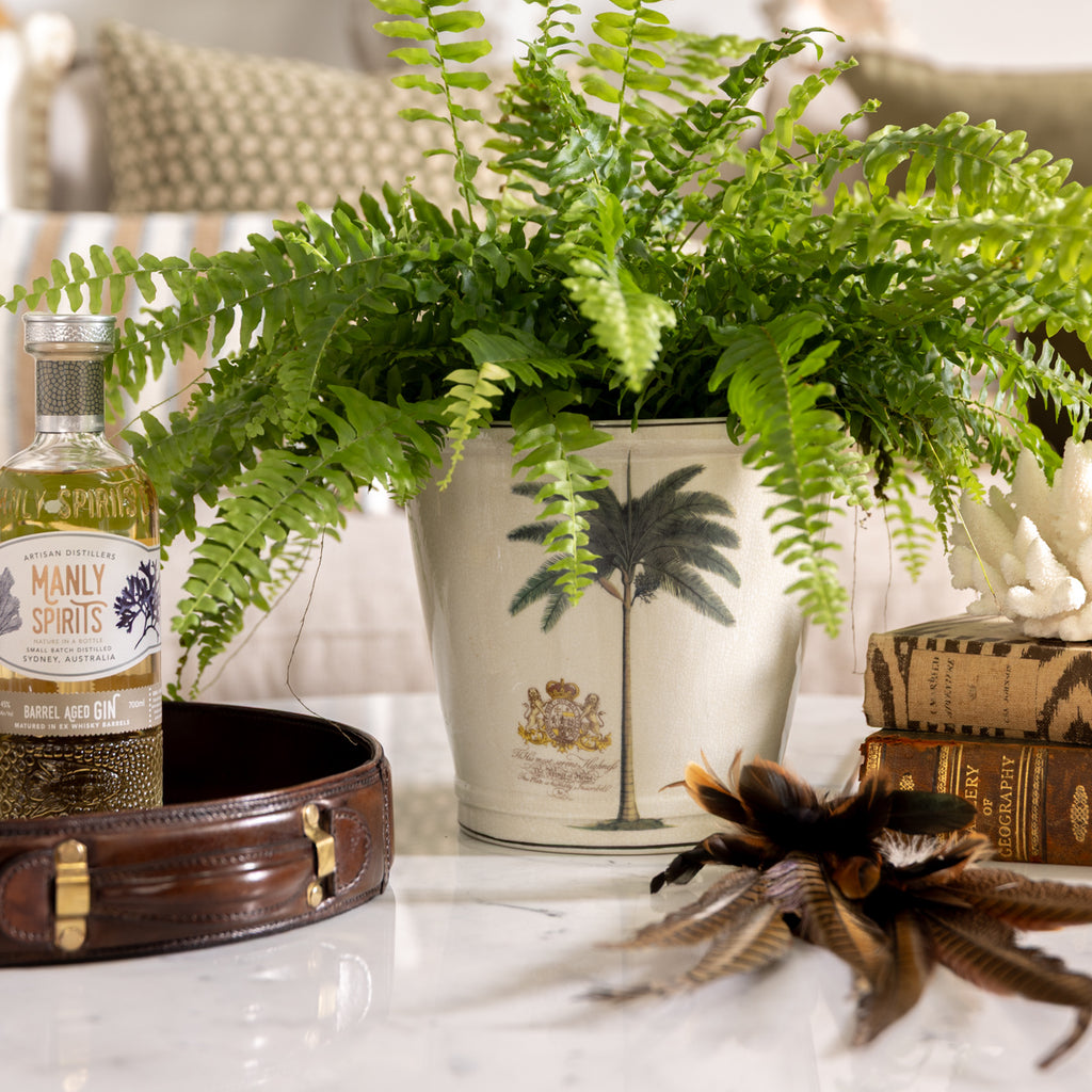 Royal Palm Planters Styled on Coffee Table with Flowers
