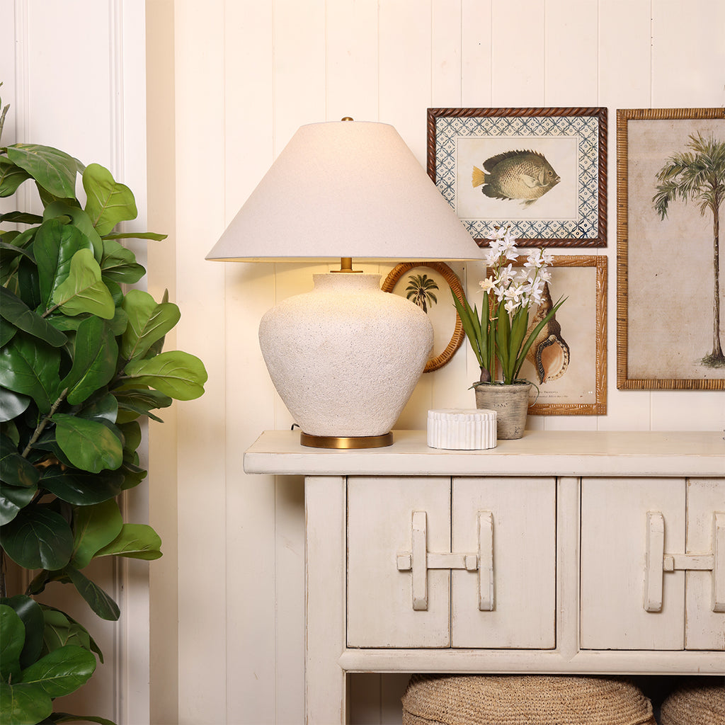 Sandy Concrete Lamp with Hero Styled on Cabinet with Artwork