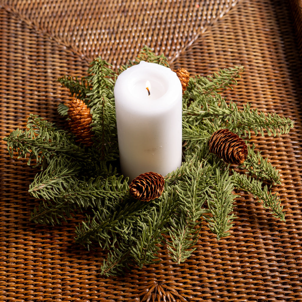Spruce Pinecone Candle Rings Styled on Rattan Tray