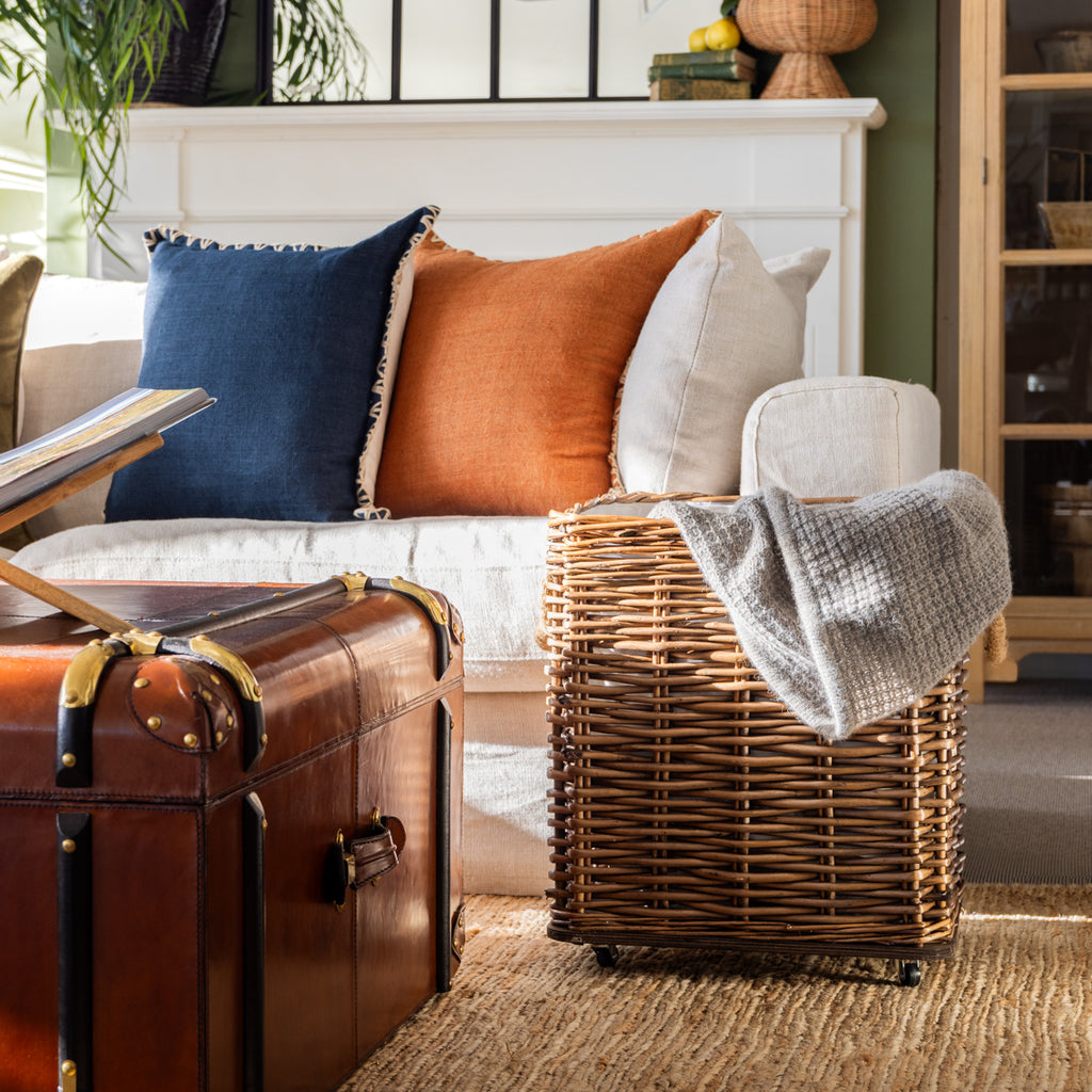 Square Willow Baskets Styled next to Soda with Blanket Inside