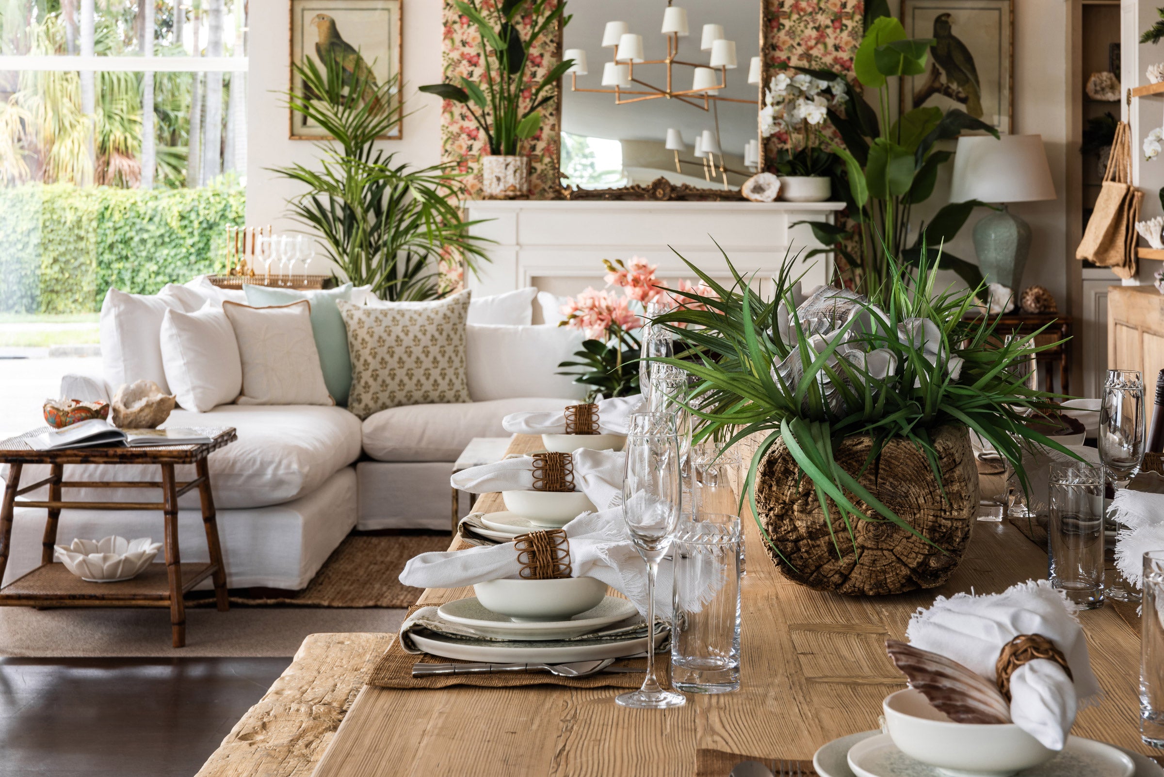 Recycled elm dining table set in a relaxed tropical style.