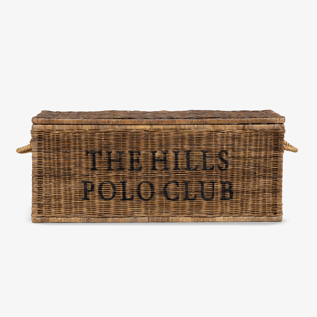 Wicker storage chest with 'The Hills Polo Club' text on a white background closed.