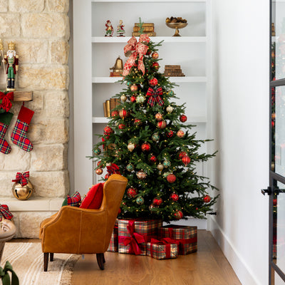 Vail Pre-Lit Christmas Trees Styled in Living Room Decorated with Baubles