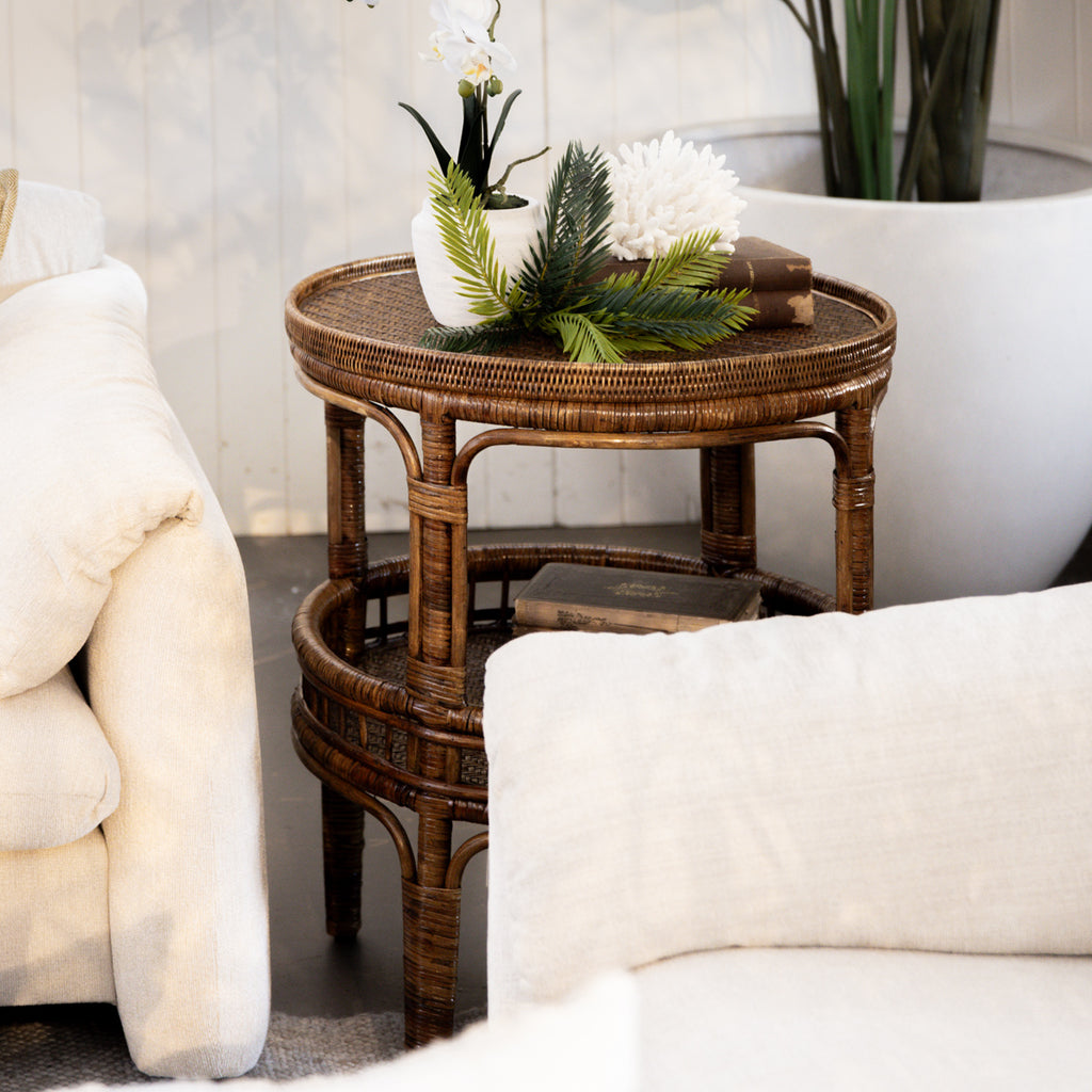 Valentina Rattan Side Table Styled in Living Room with Plants and Books