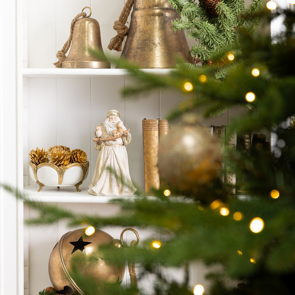 Woodland Santa Ornament Styled on Bookcase 