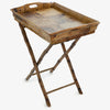 A collapsible bamboo butler's tray with a removable top tray, featuring a natural bamboo finish.