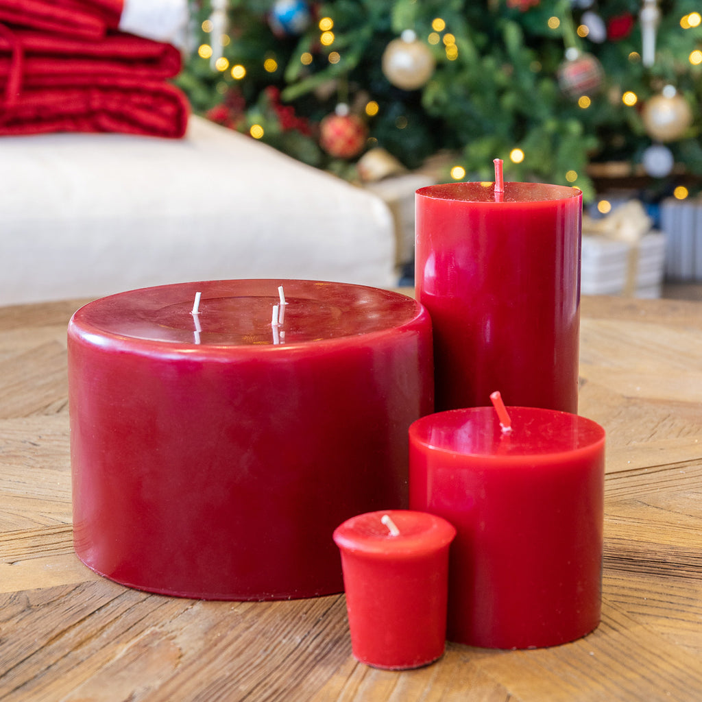 Red candles grouped on table