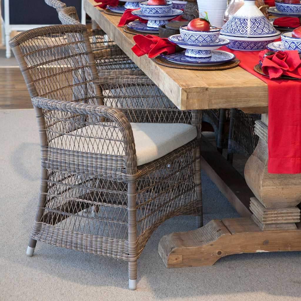 Hampton outdoor dining chairs around a rectangle wooden dining table